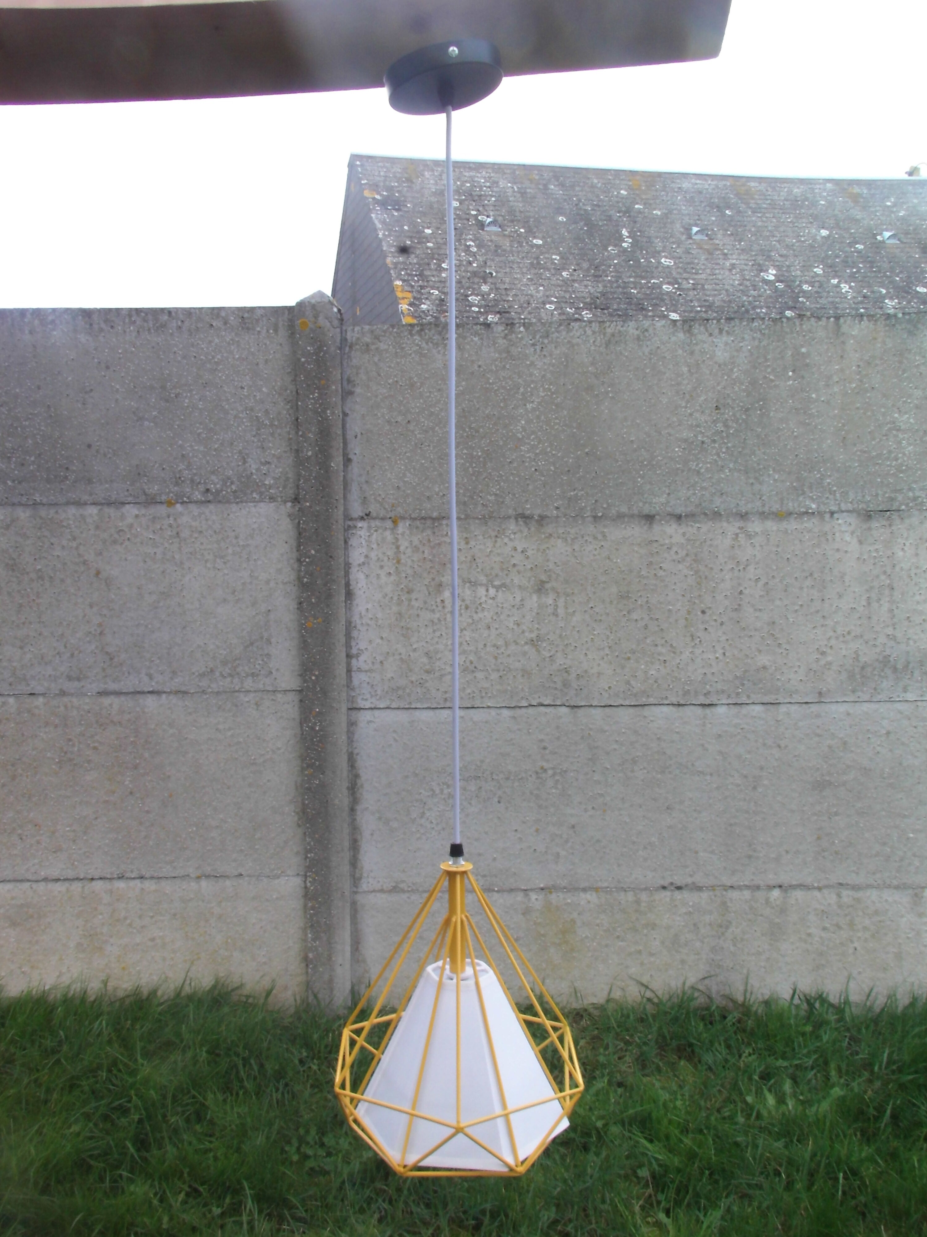 Yellow metal suspension with white blind