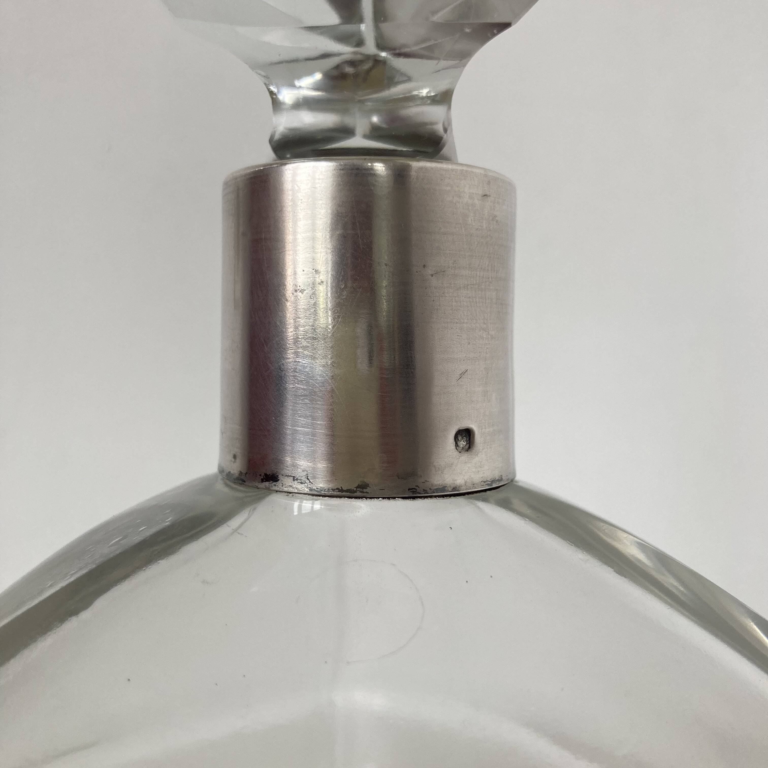 Beautiful cut crystal carafe with its stopper and solid silver setting