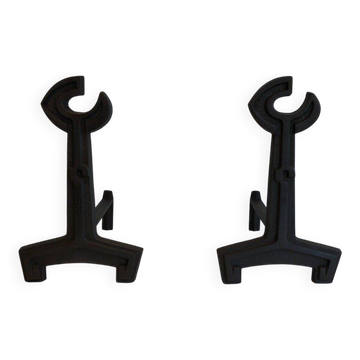 Pair of modernist andirons in cast iron and wrought iron