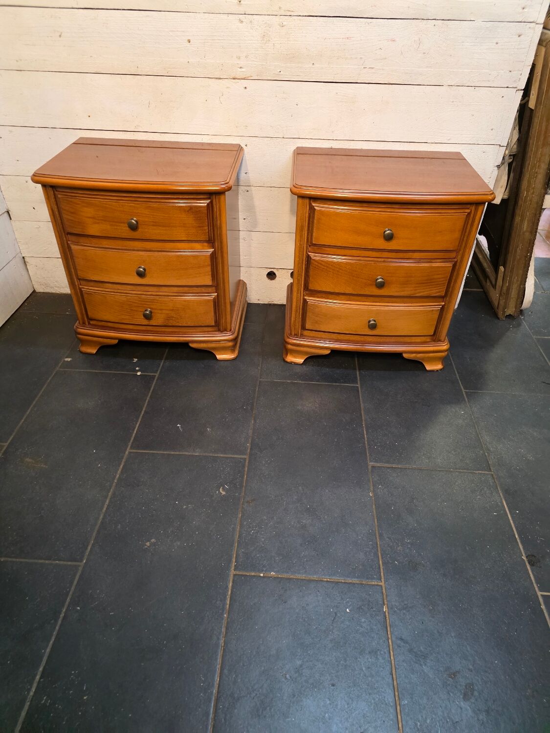 Pair of Louis Philippe style bedside tables in cherry wood.