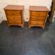 Pair of Louis Philippe style bedside tables in cherry wood.