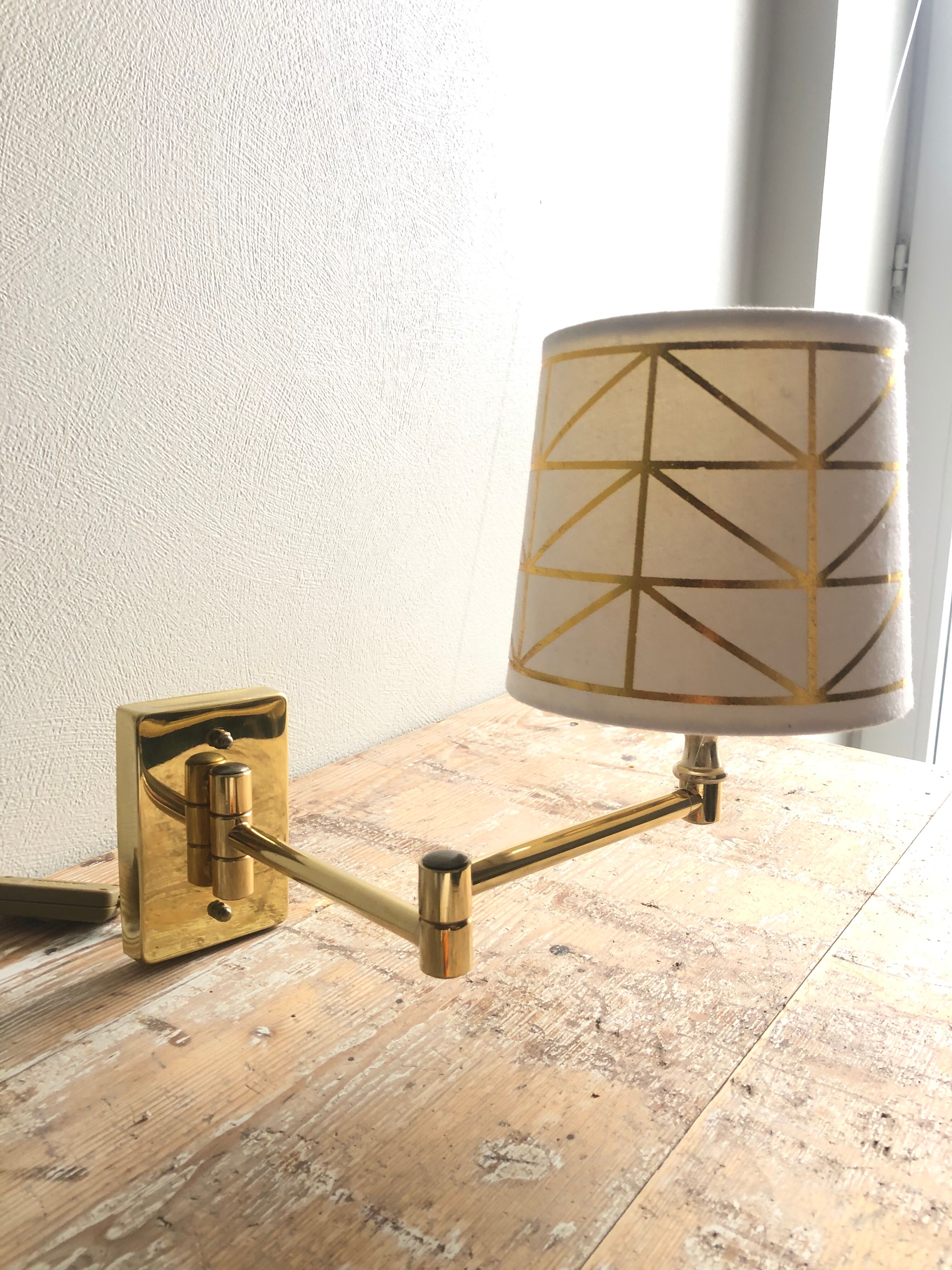 Deschuytener brass articulated wall lamp