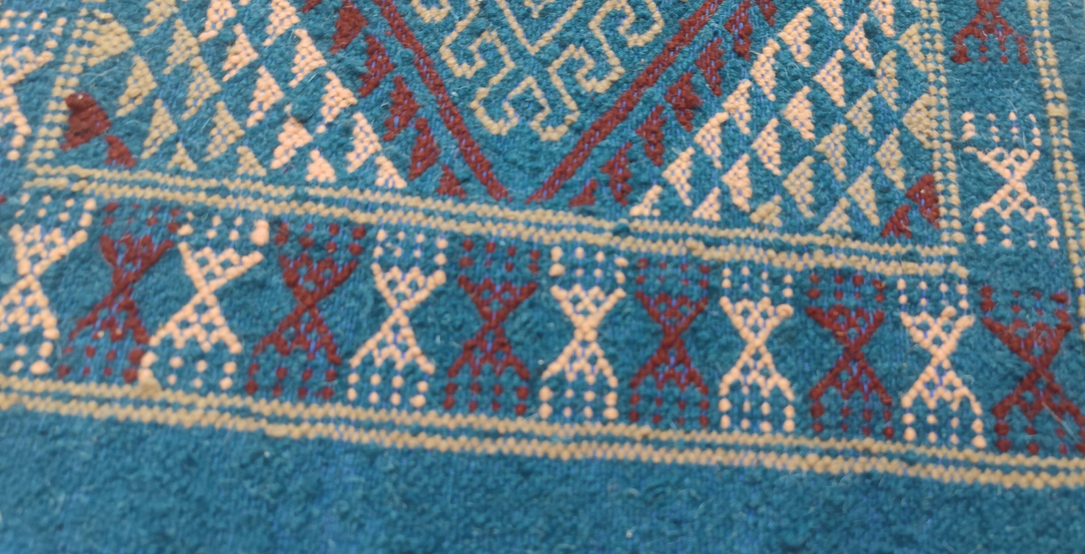 Handmade blue mergoum rug in natural wool