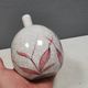 A vase in crackled porcelain with pink decoration. Germany 1930s