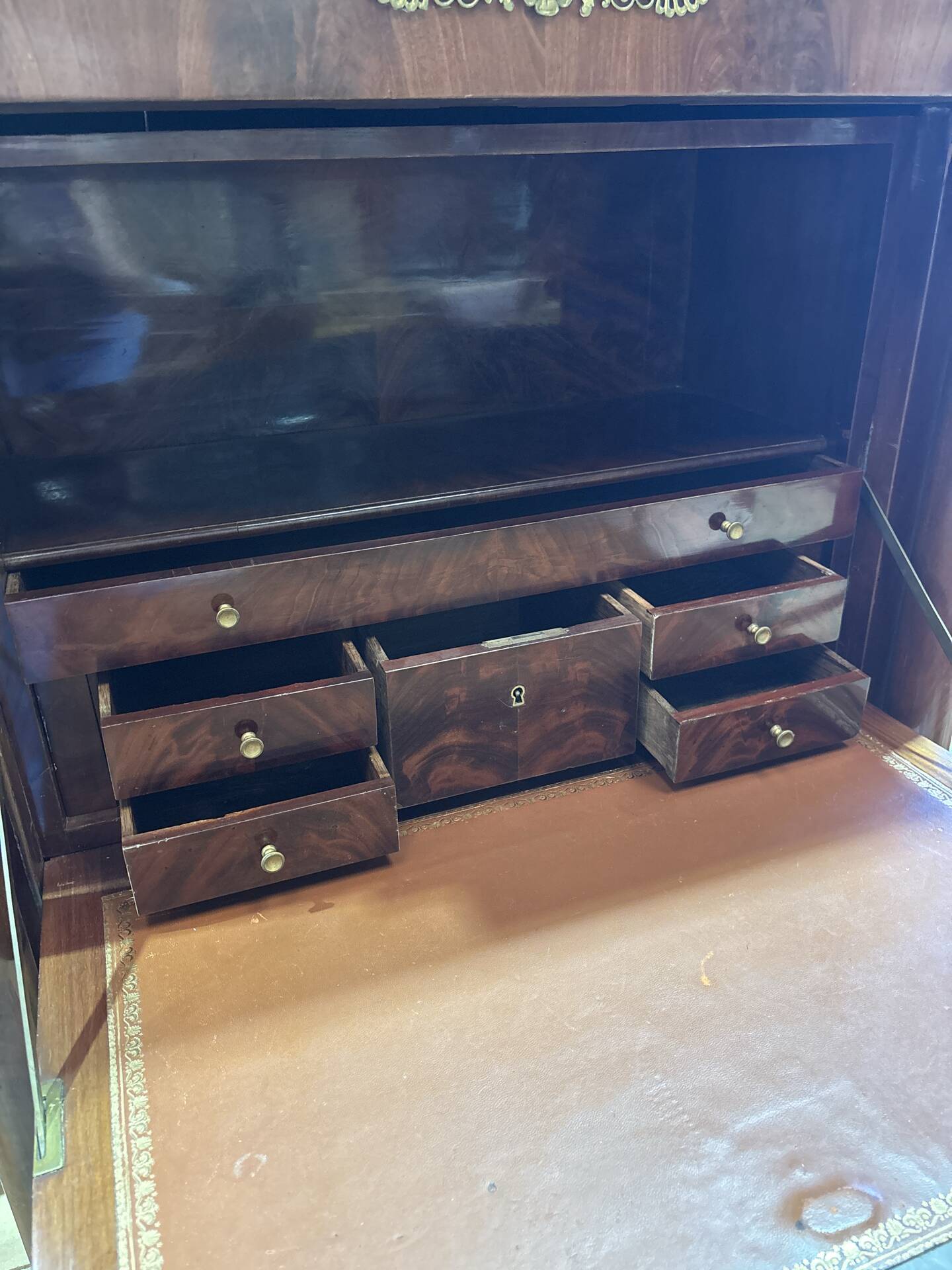Empire secretary in mahogany, bronze and marble with secret drawers.
