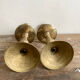 Pair of engraved brass candle holders