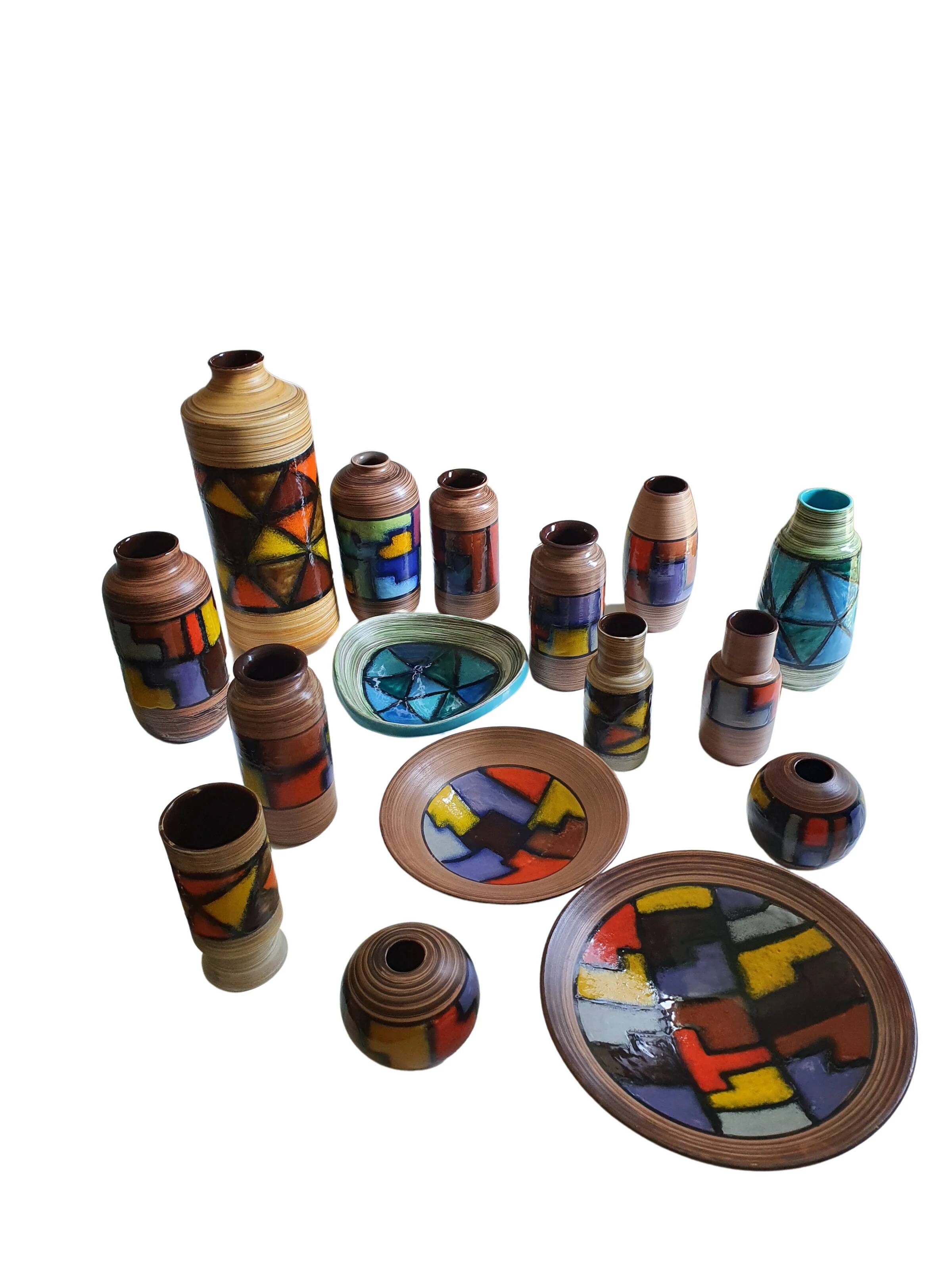 Mid-century pattern Vetrata vases and bowls by Aldo Londi for Bitossi Italy. Black, blue, orange and yellow on a brushed background.