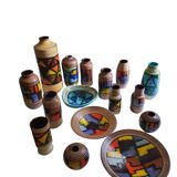 Mid-century pattern Vetrata vases and bowls by Aldo Londi for Bitossi Italy. Black, blue, orange and yellow on a brushed background.