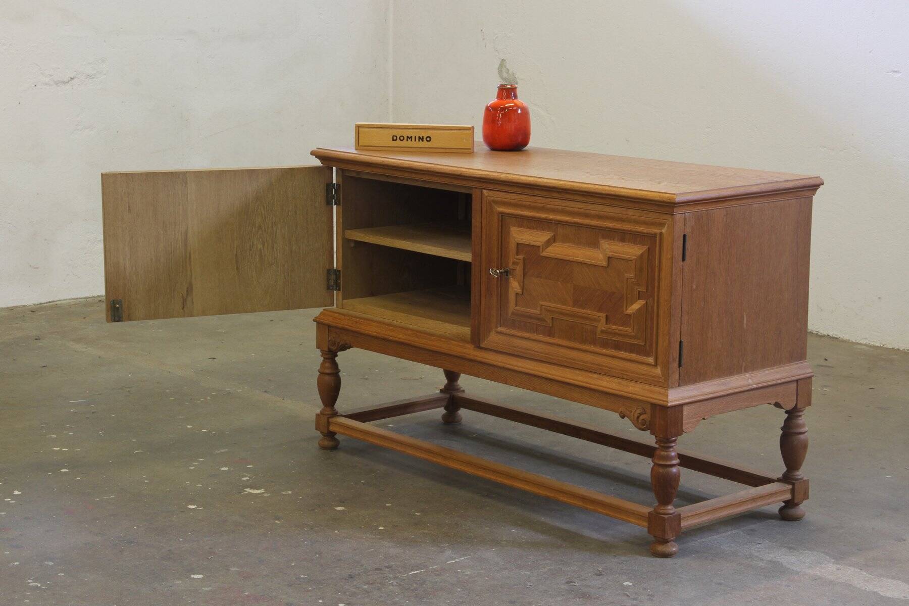 Vintage low sideboard in oak by Henning Kjærnulf, 1960s