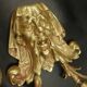 Pair of wall sconces with grotesque heads in 19th-century Renaissance style - bronze