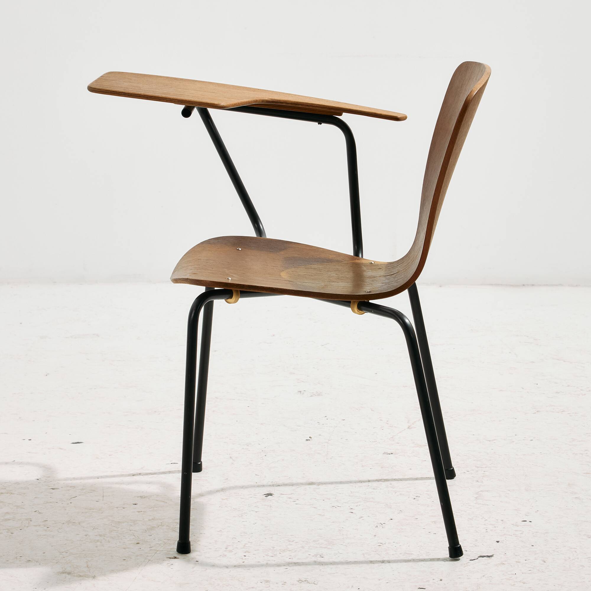 Teak chair with writing tablet