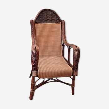 Old rattan armchair circa 1900-1930