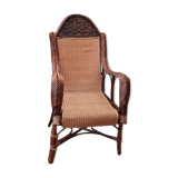 Old rattan armchair circa 1900-1930