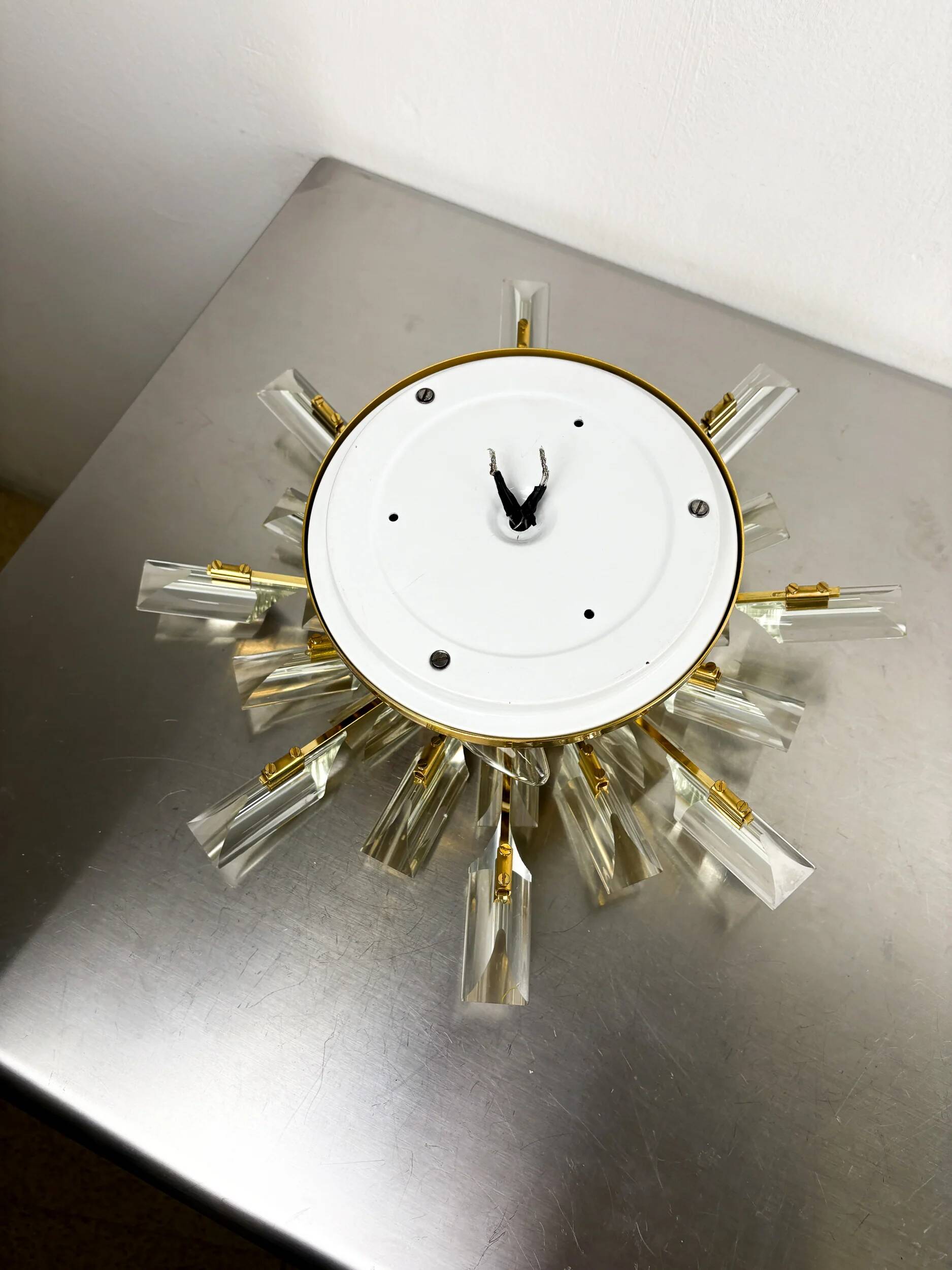 Sun-shaped ceiling or wall light by Oscar Torlasco for StilKronen, cut Murano glass, Italy, 1970s