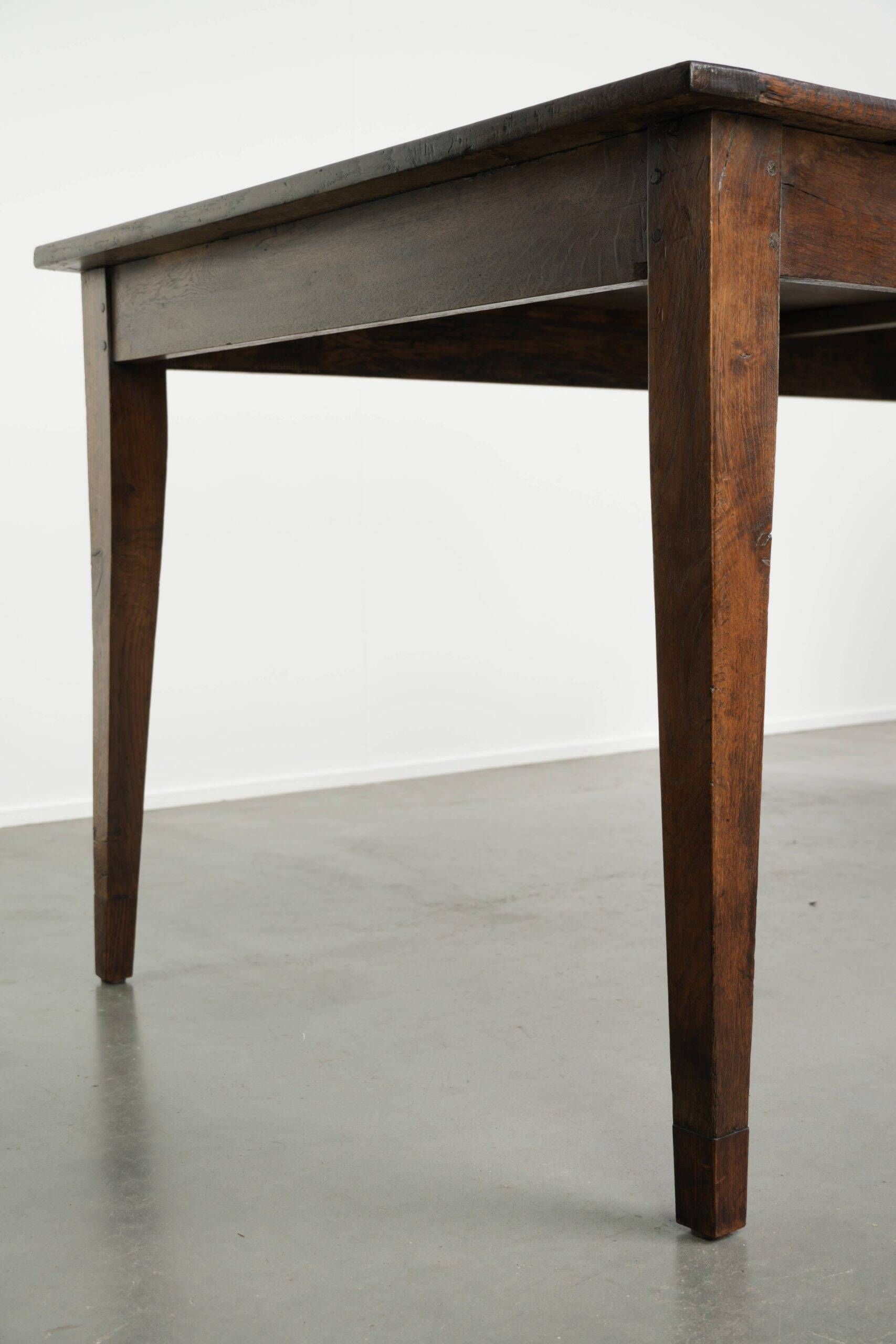 Antique French oak dining table from the early 19th century