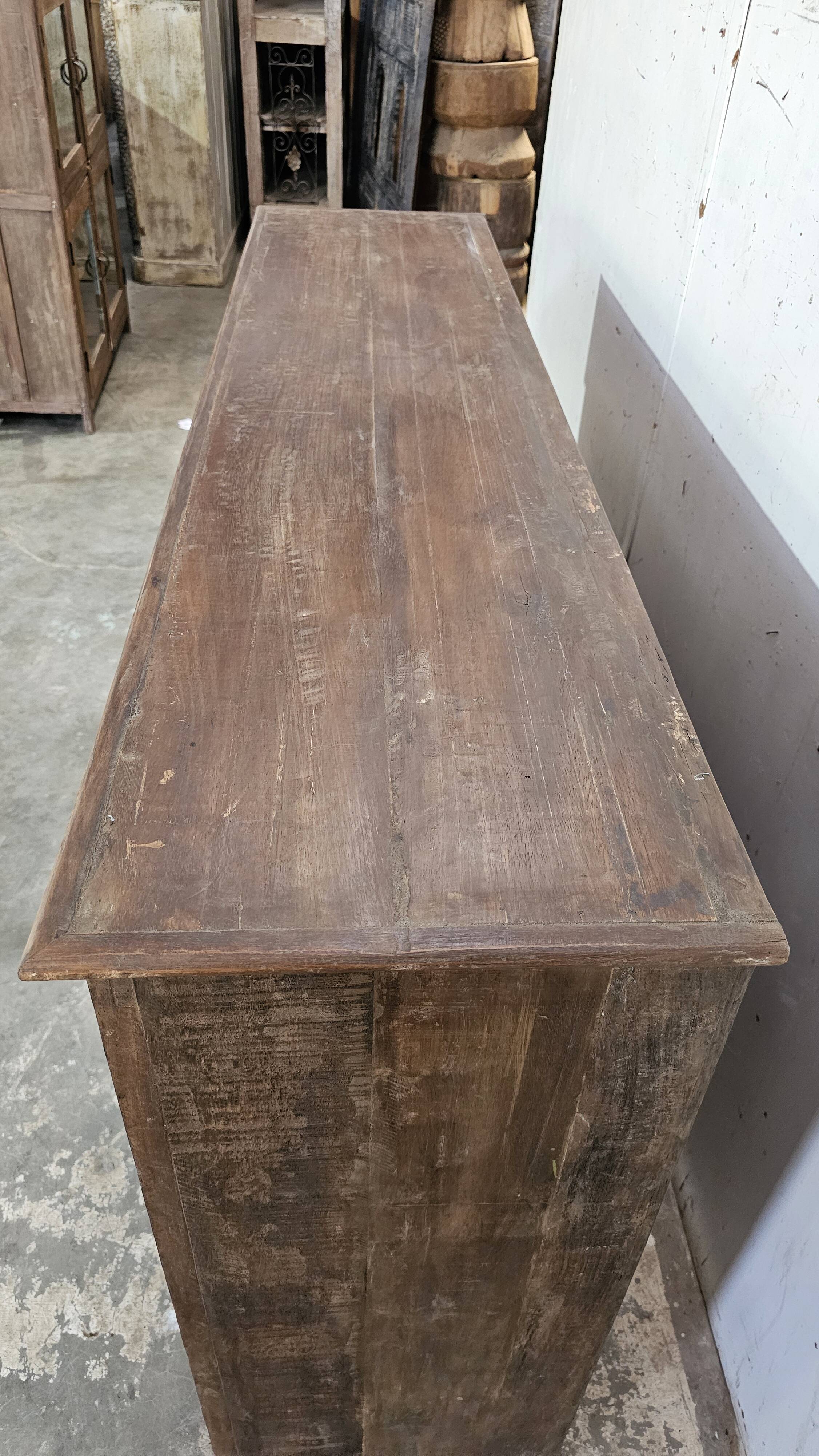Antique glass-fronted buffet in Burmese teak