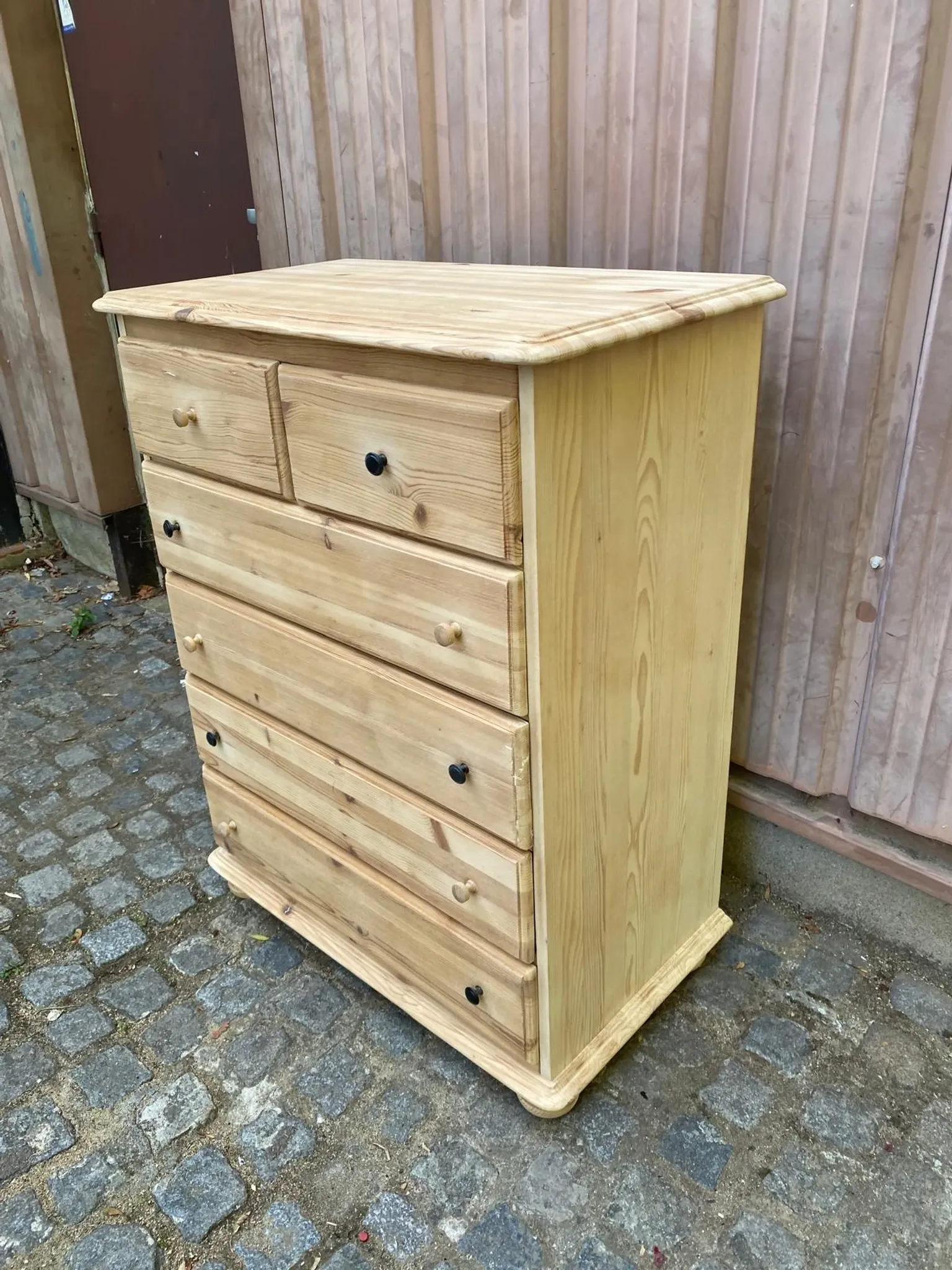 High Scandinavian chest of drawers stripped in solid pine from the 1980s.