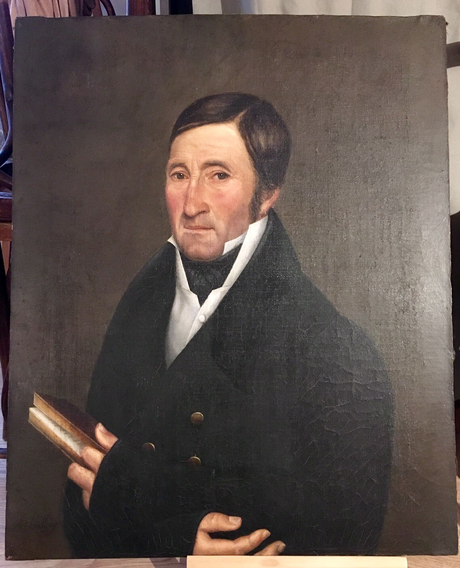 Signed painting, portrait of a gentleman with a book and an earring: 19th century