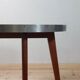 Vintage metal and teak side table from the 1950s.