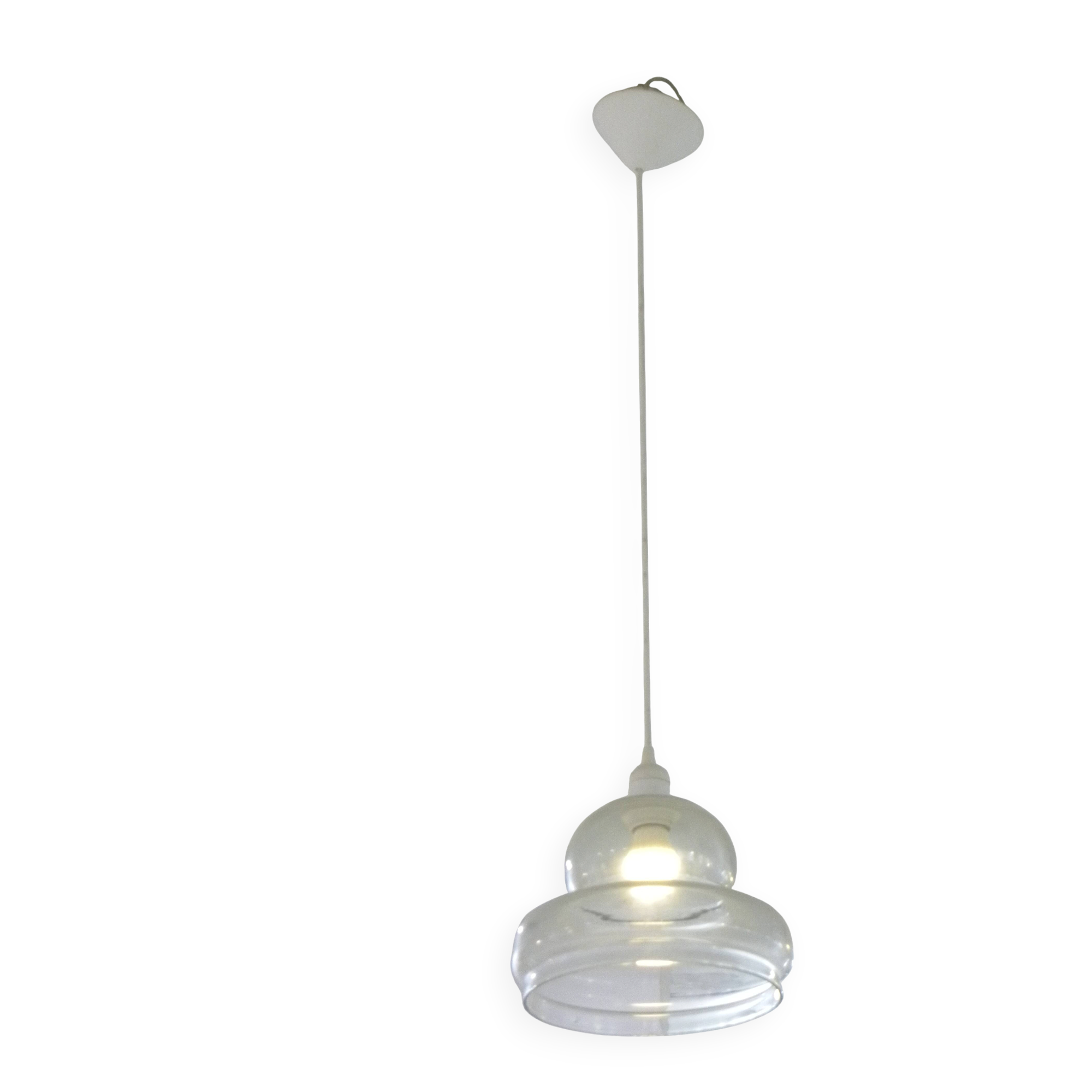 Suspended lamp in transparent blown glass, modern, minimalist, timeless style.