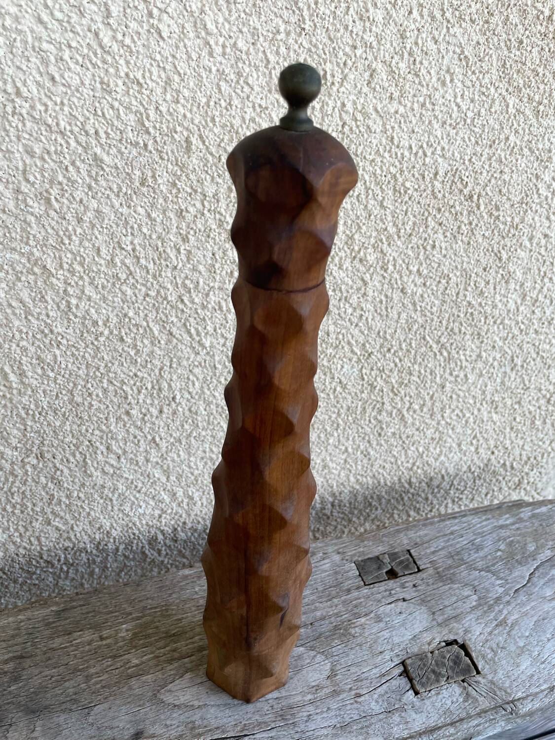 Large carved wooden pepper mill