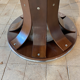 Round, extendable dining table