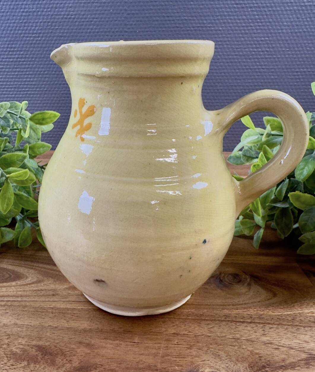 Earthenware pitcher from Savoy with bird decoration.