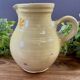 Earthenware pitcher from Savoy with bird decoration.