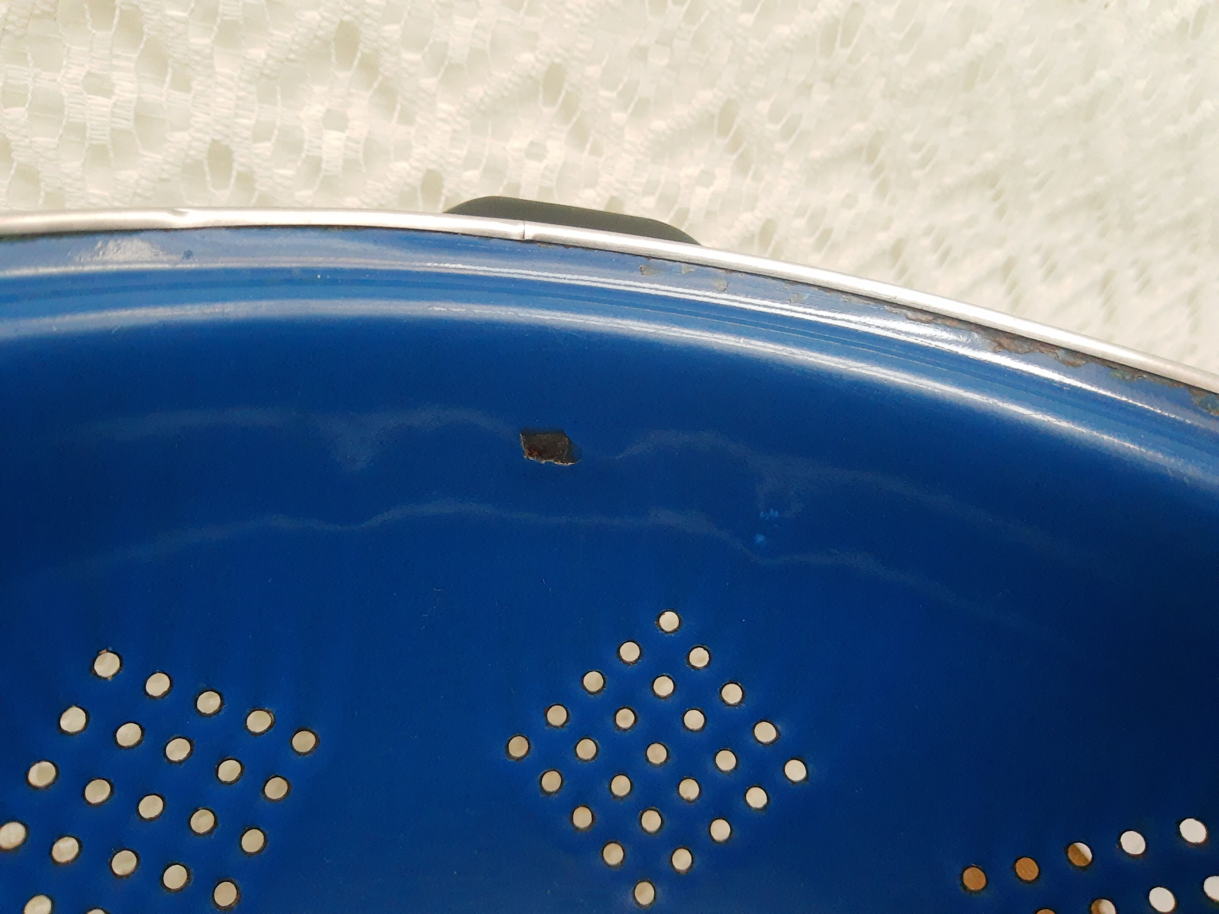 Vintage blue enamelled strainer