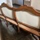 Louis XV style canapé from the late 19th century with a stretcher.
