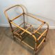 Rattan rolling table and leather ties