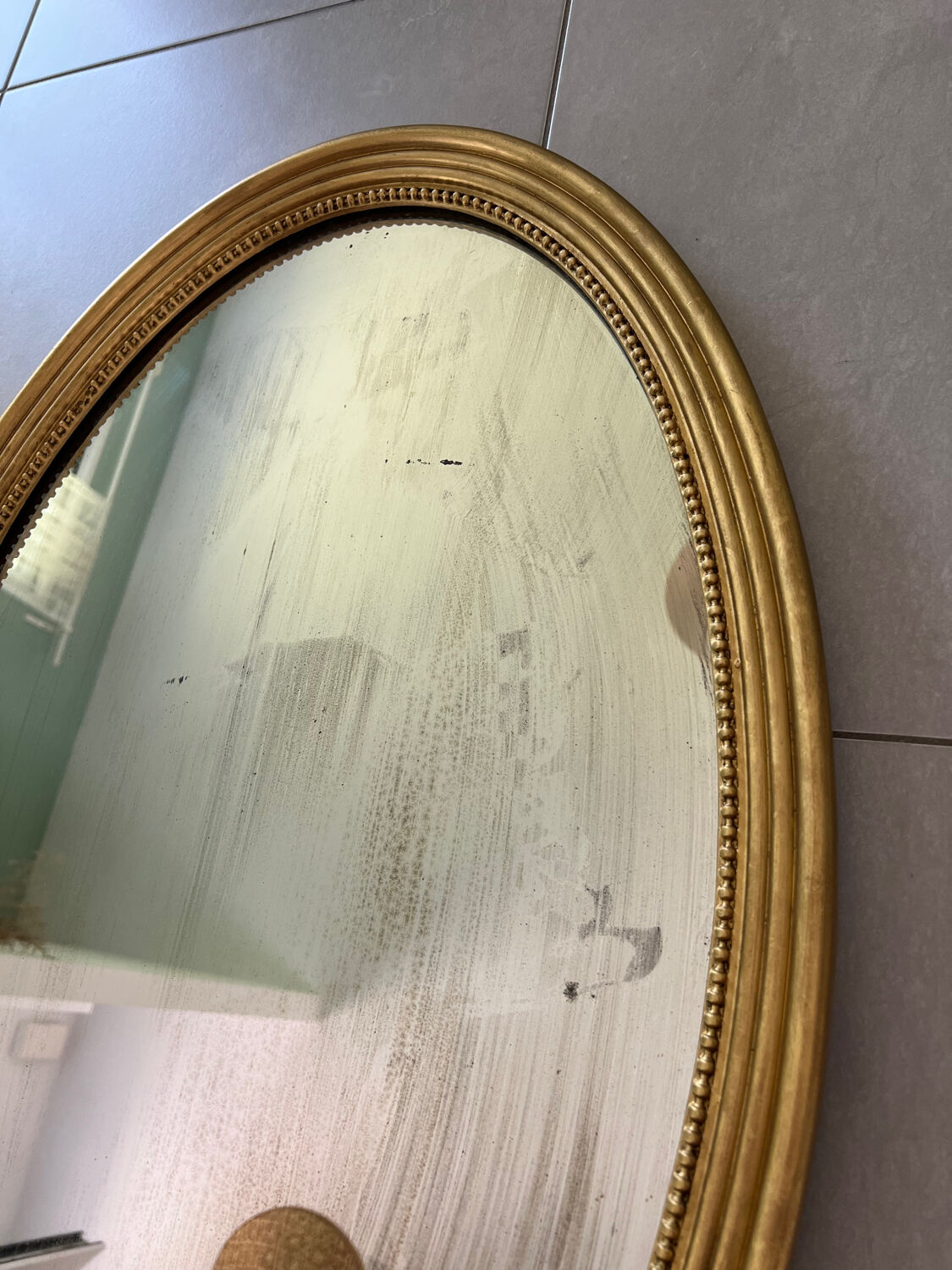 Vintage oval gold mirror