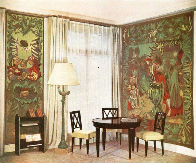 Art Deco mahogany round table by Jacques Adnet around 1940