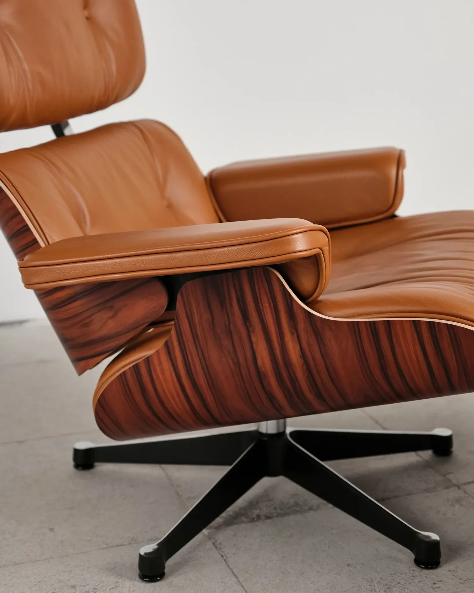 Lounge Chair and ottoman in rosewood by Charles & Ray Eames, Vitra