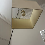 Cinna floor lamp in wood, chrome, and fabric.