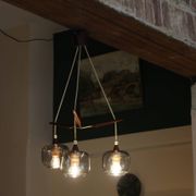 Scandinavian chandelier "Cascade" from the 1960s in brass, teak, and smoked glass.