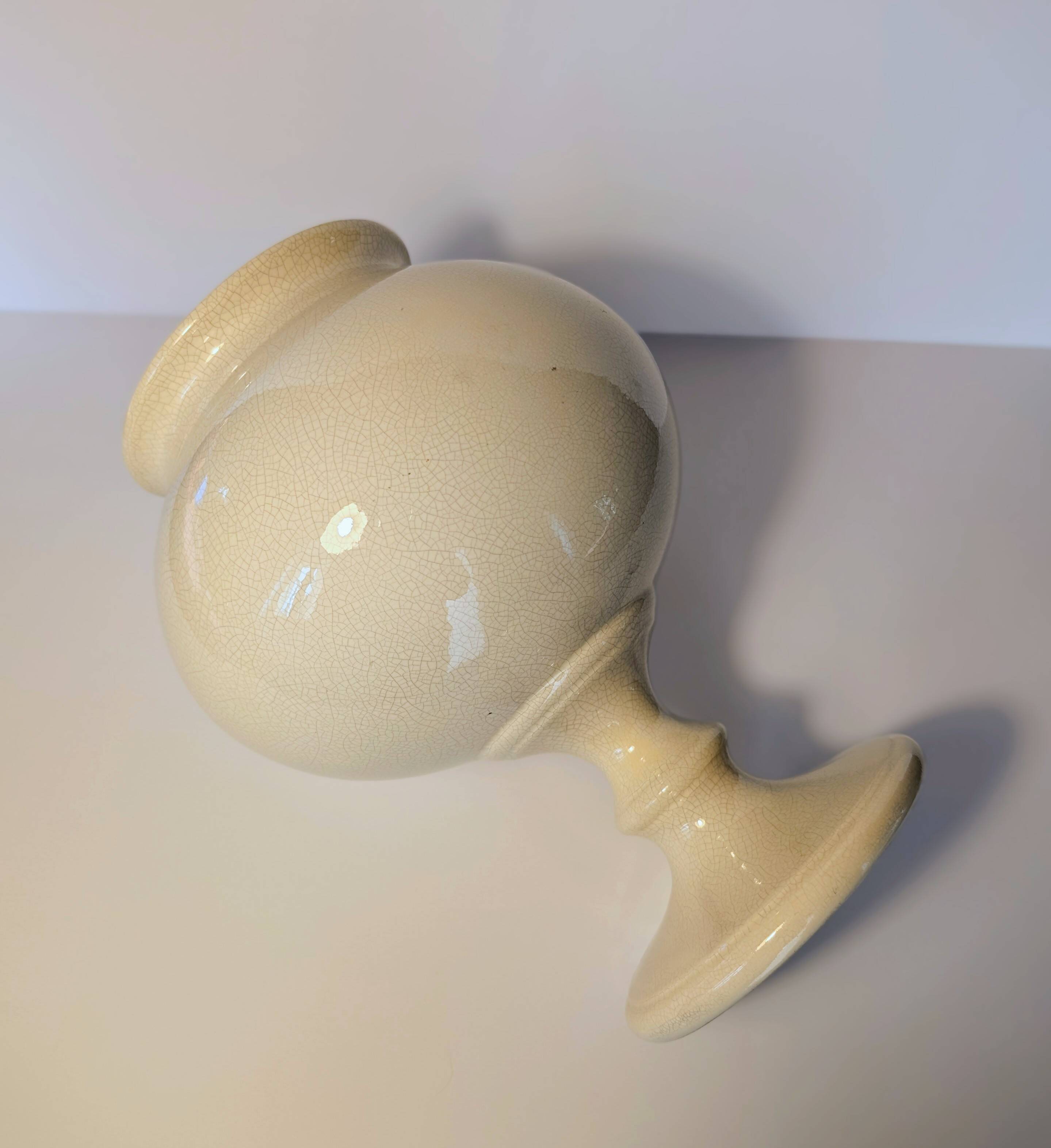 Cracked cream ceramic leech cup