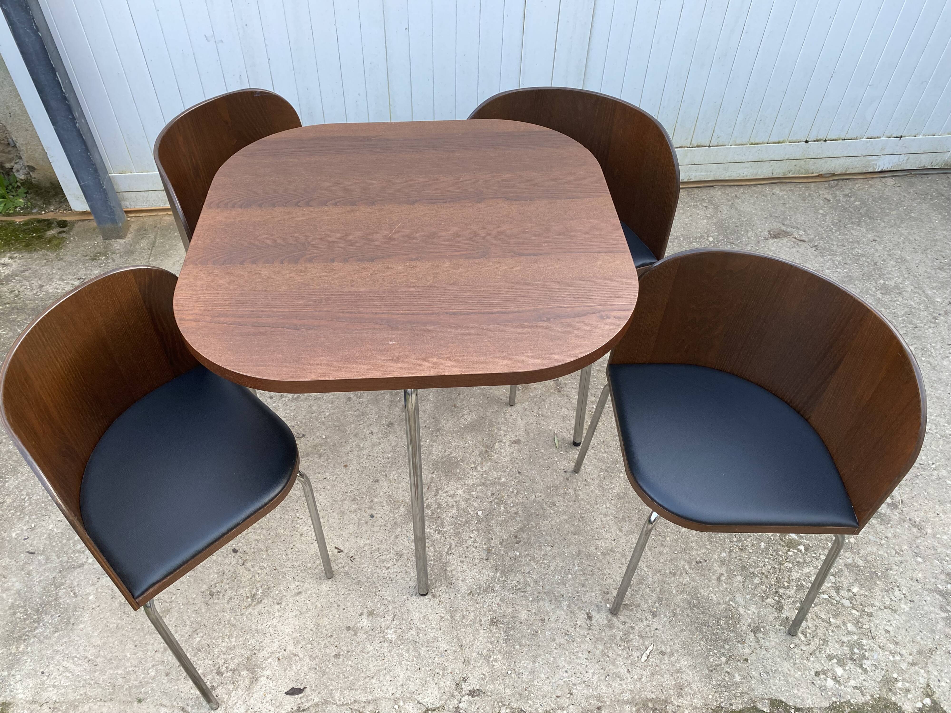 Fusion table and 4 teak chairs by Sandra Kragnert IKEA.