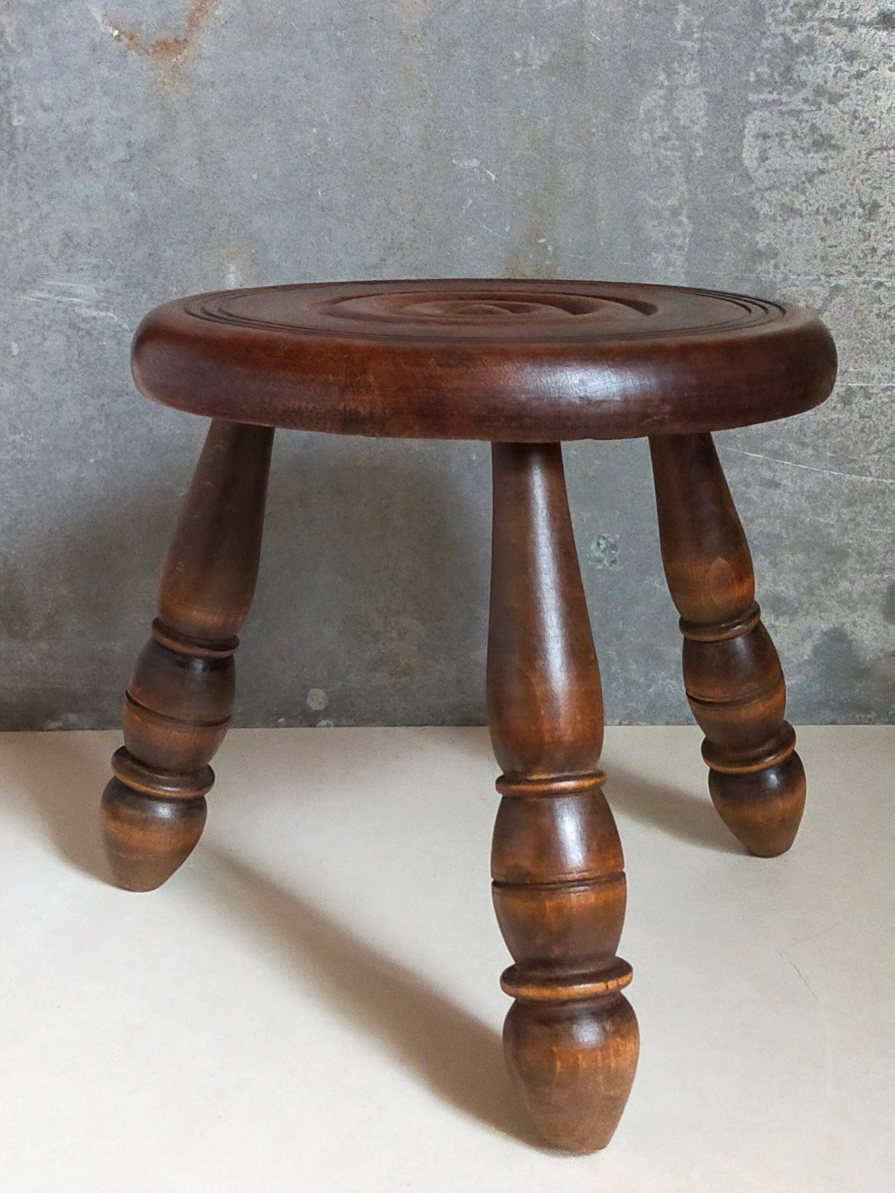 Low tripod stool in vintage turned solid wood