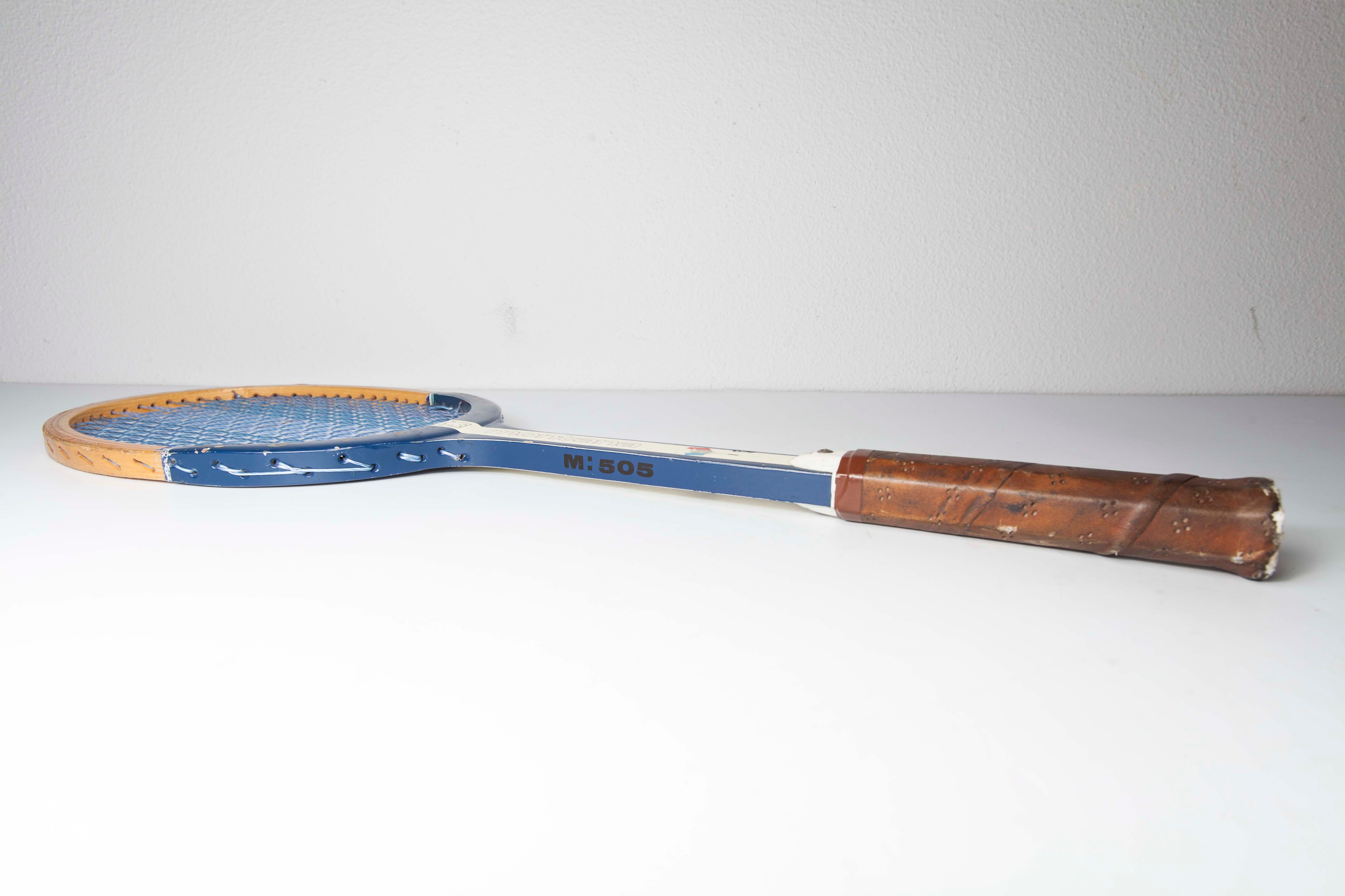 Blue Montana M505 racket with leather bag