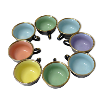 8 tasses et sous-tasses en porcelaine noires