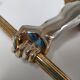 Pair of vintage patinated golden metal hand sconces