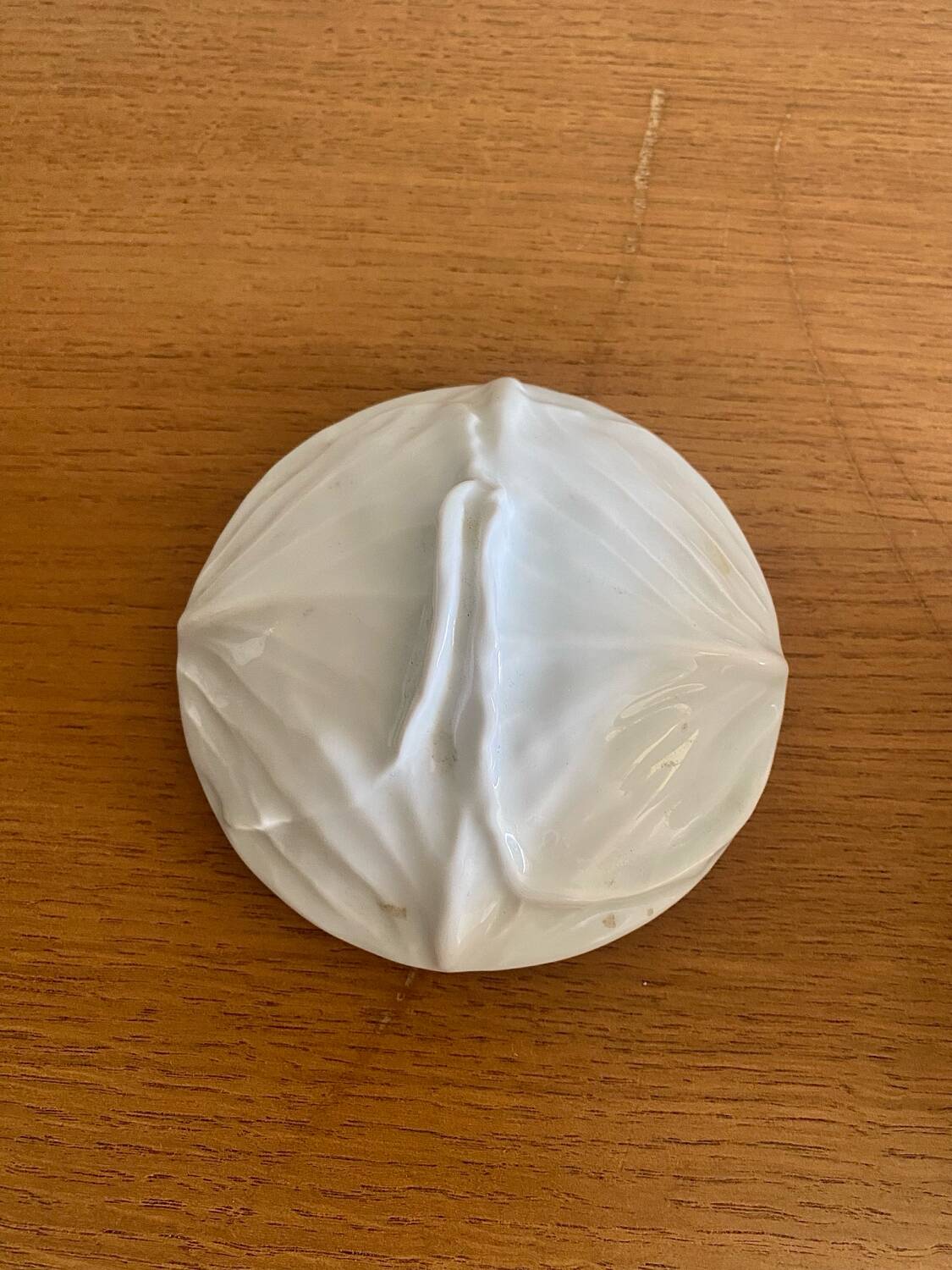 Old covered pot in 19th-century faience with cabbage decoration.