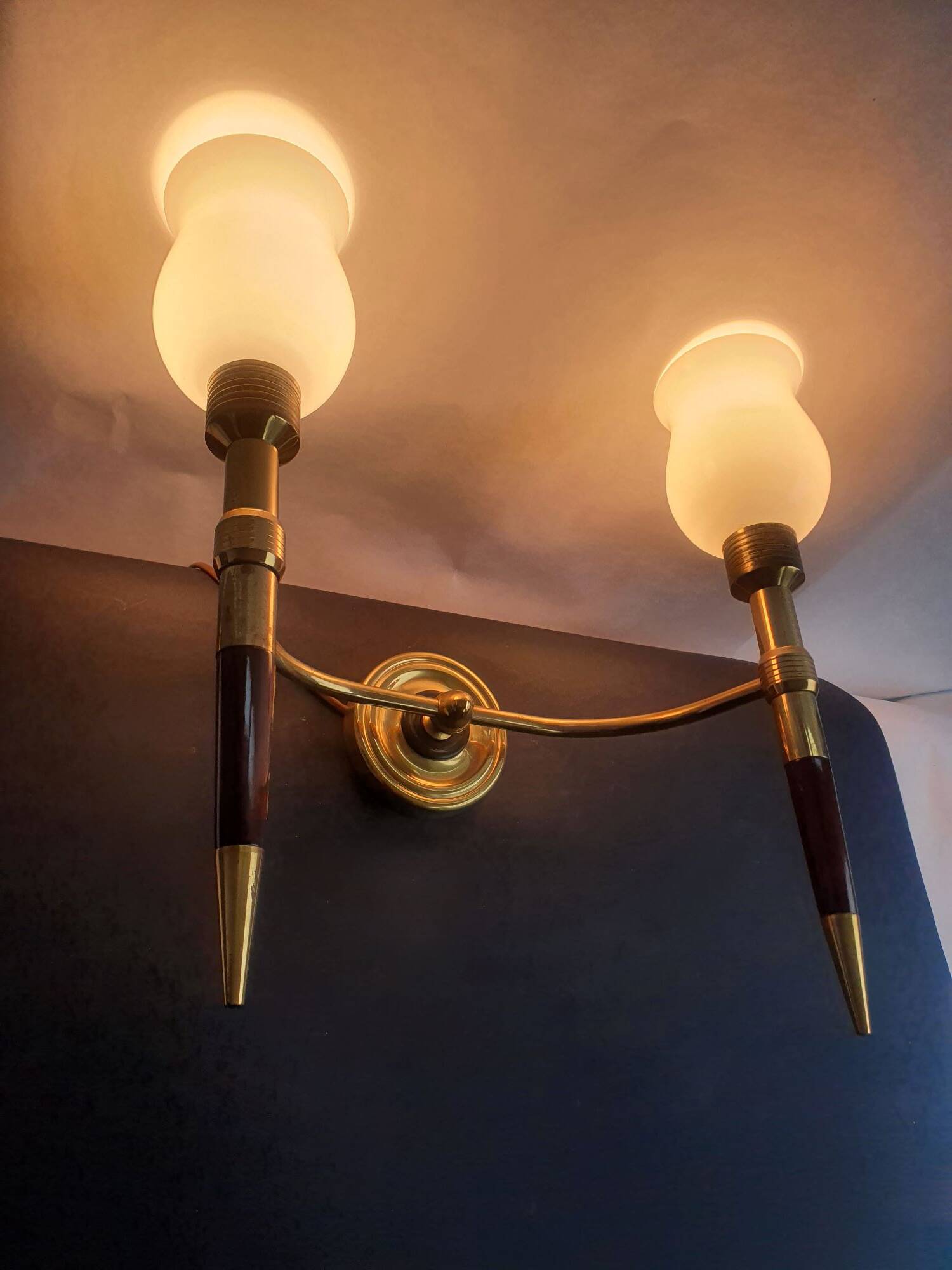 Pair of large torch-style wall sconces from the 1950s