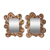 According to the model “the waves” by Jean Boggio: pair of designer gold mirrors circa 1980
