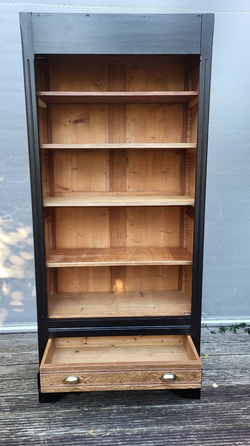 Two-tone black and honey bookcase