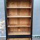 Two-tone black and honey bookcase