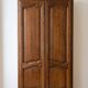 Antique wooden wardrobe in vintage style