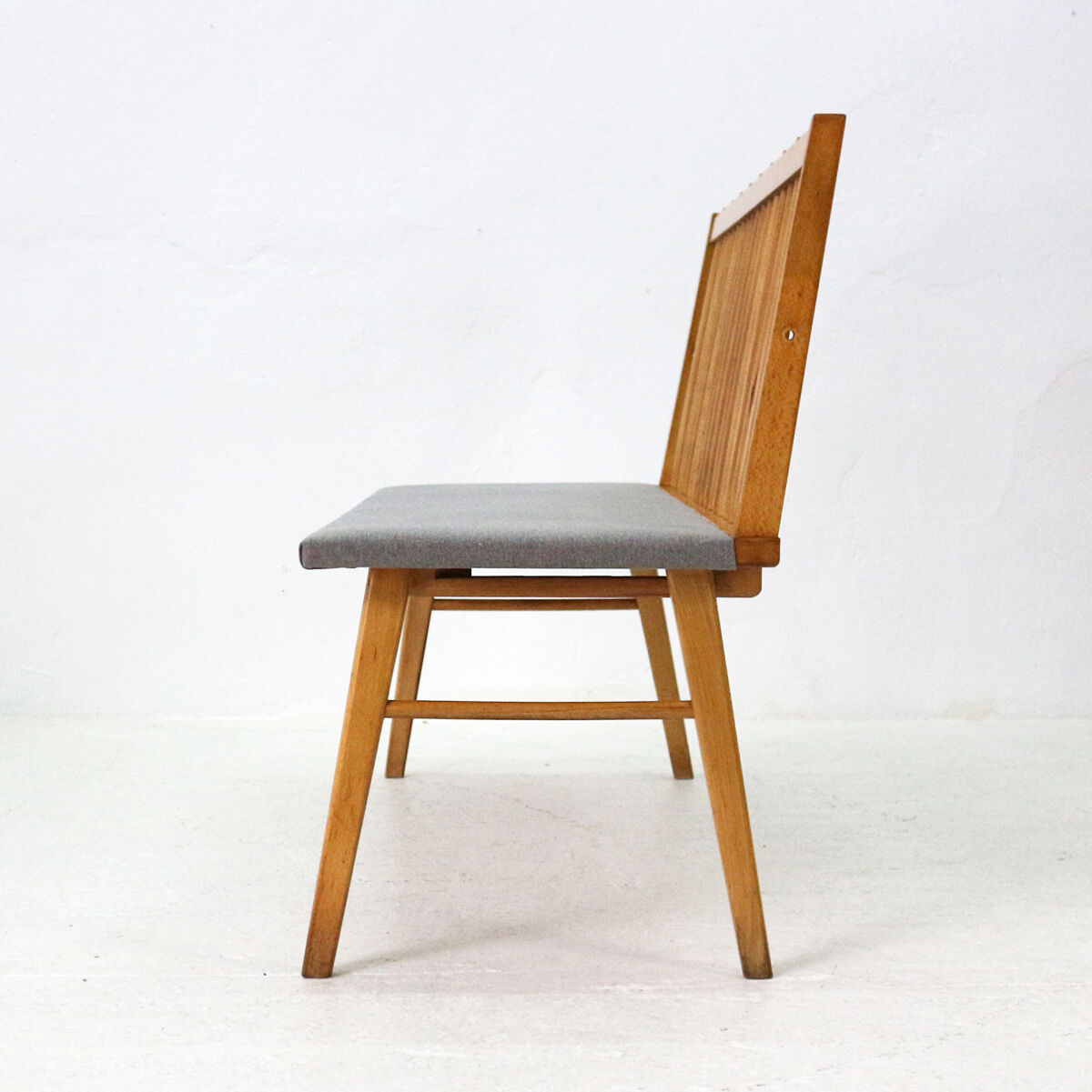 Reupholstered beechwood bench, 1950