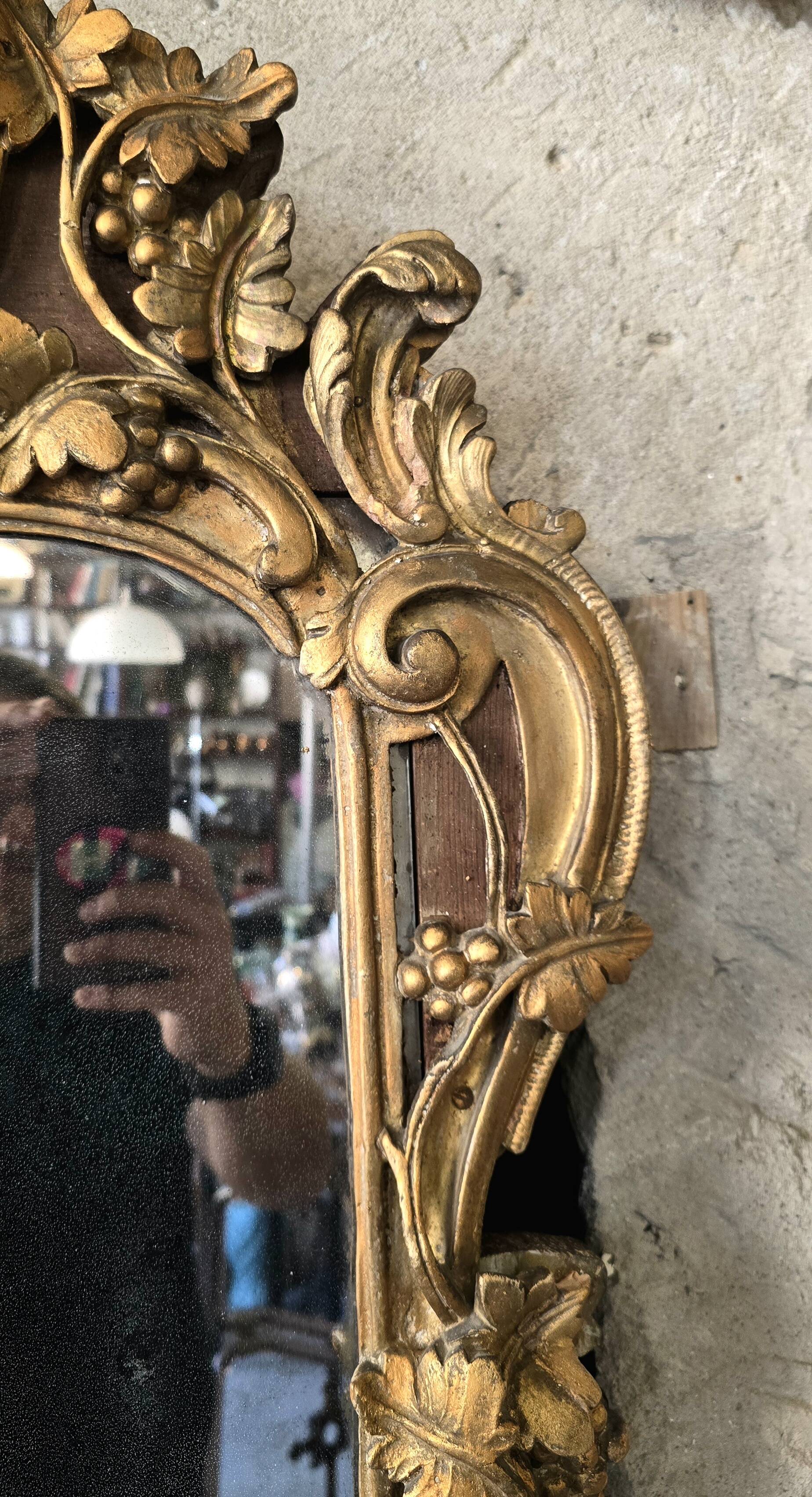 Louis XV period mirror in gilded wood and stucco, 18th century